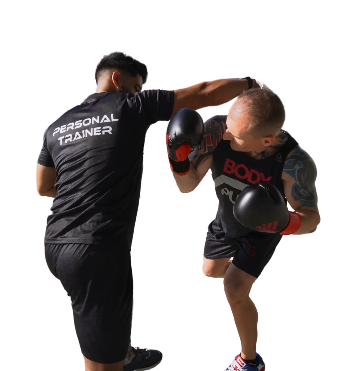 FlexAndPunch Fitness trainers jasir zarkoob and Cleber Marcolan practising boxing